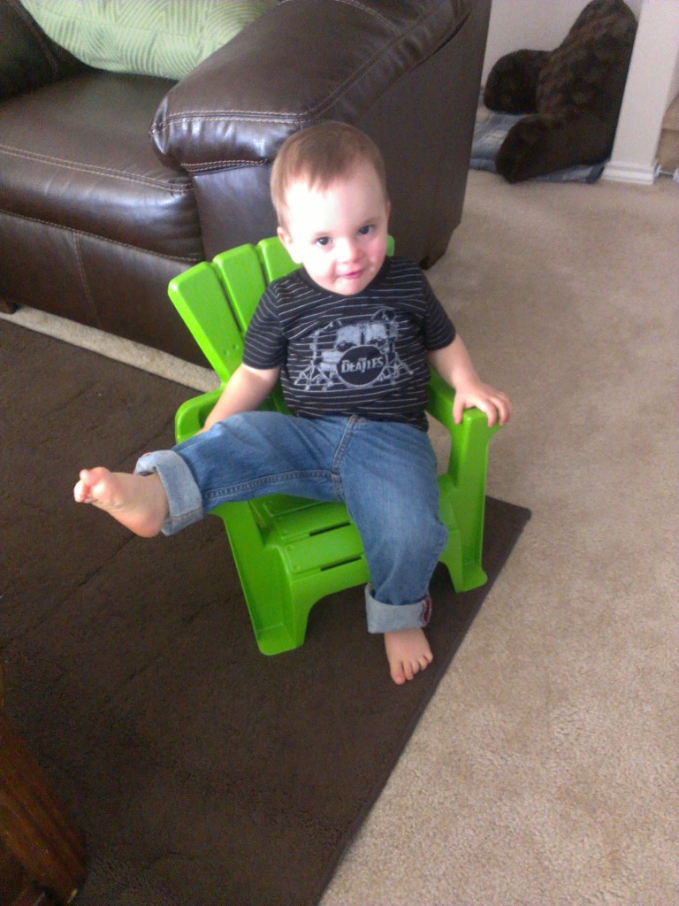 Trying to sit like Mommy. I guess I need to sit properly more often!